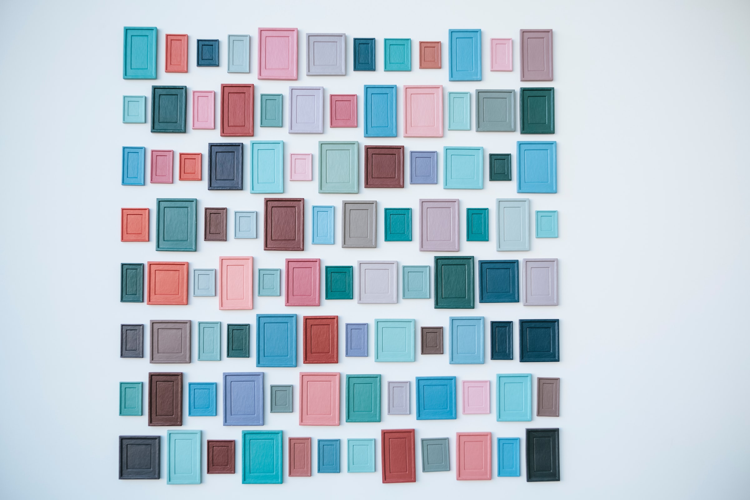 Photograph of colored squares hanging on a wall