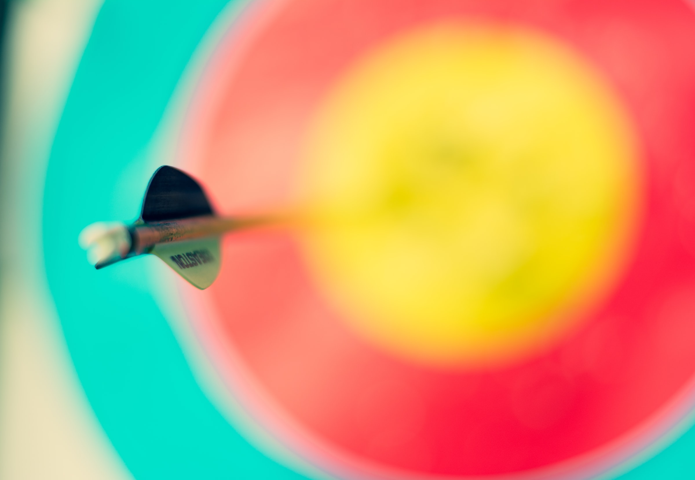 Photograph of an arrow hitting the target